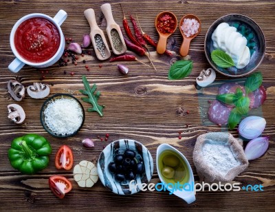 The Ingredients For Homemade Pizza On Shabby Wooden Background Stock Photo