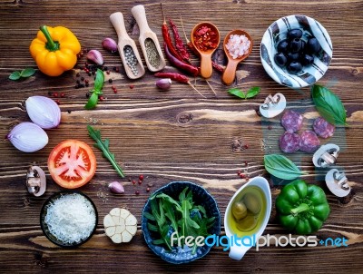 The Ingredients For Homemade Pizza On Shabby Wooden Background Stock Photo