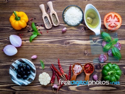 The Ingredients For Homemade Pizza On Shabby Wooden Background Stock Photo