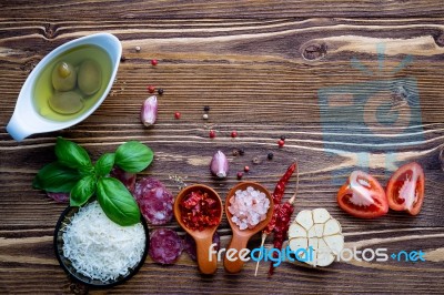 The Ingredients For Homemade Pizza On Shabby Wooden Background Stock Photo