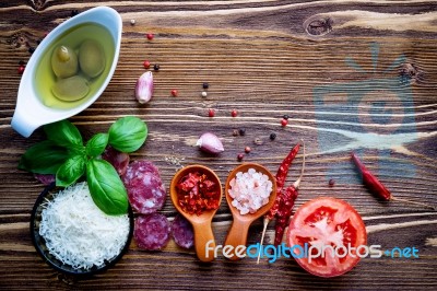 The Ingredients For Homemade Pizza On Shabby Wooden Background Stock Photo