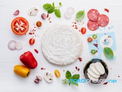 The Ingredients For Homemade Pizza On White Wooden Background Stock Photo