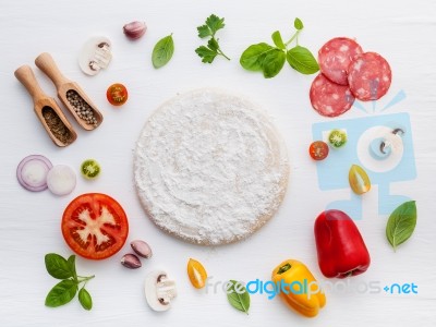 The Ingredients For Homemade Pizza On White Wooden Background Stock Photo