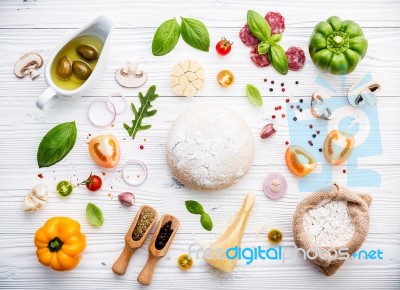 The Ingredients For Homemade Pizza On White Wooden Background Stock Photo