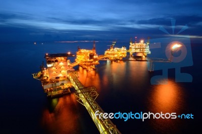 The  Large Offshore Oil Rig At Night Stock Photo