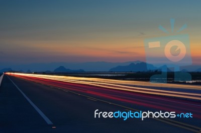 The Light Trails On The Street With Sunset Stock Photo