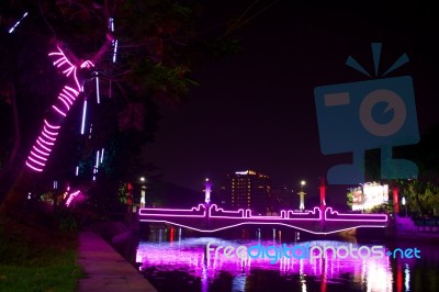  The Lights Of The Bridge And The River In The Middle Of The City Stock Photo