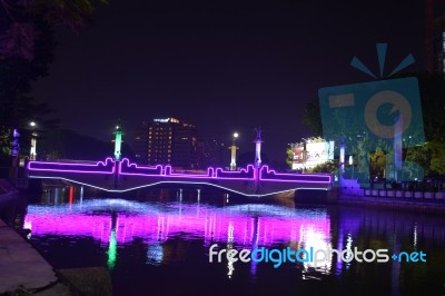  The Lights Of The Bridge And The River In The Middle Of The City Stock Photo