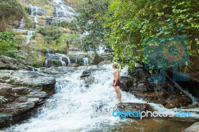 The Man Standing At Mae Ya Waterwall Stock Photo