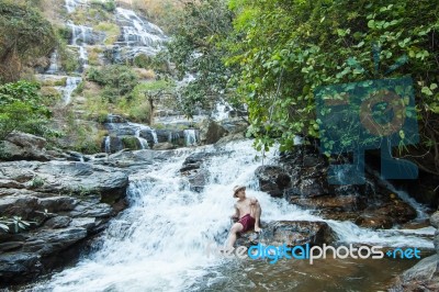 The Man Standing At Mae Ya Waterwall Stock Photo