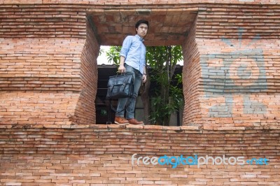 The Man Stands At The Door Stock Photo