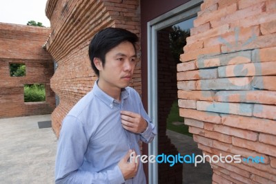 The Man Stands At The Door Stock Photo