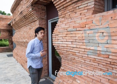 The Man Stands At The Door Stock Photo