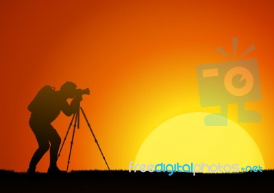 The Man Work With The Camera On A Background Of The Sun Stock Image