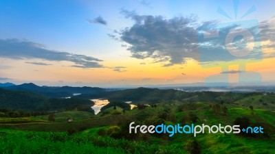 The Mountain Landscape View On Sunset At 