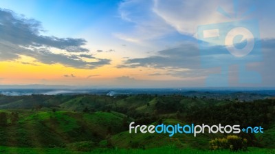 The Mountain Landscape View On Sunset At 