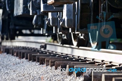 The Photo Of The Moving Train Wheels Stock Photo