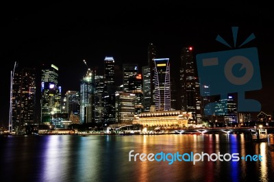 The Singapore Skyline At Night Stock Photo