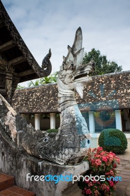 The Statue Of King Of Nagas At The Entrance Of A Buddhist Temple… Stock Photo