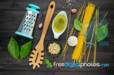 The Thin Spaghetti On Black Wooden Background. Yellow Italian Pa… Stock Photo