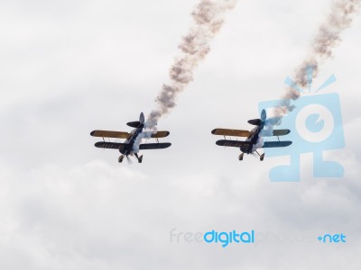 The Trig Aerobatic Team Flying Over Biggin Hill Airport Stock Photo