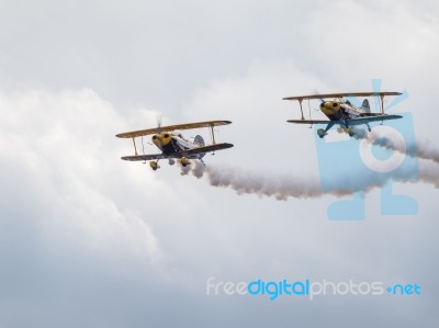 The Trig Aerobatic Team Flying Over Biggin Hill Airport Stock Photo