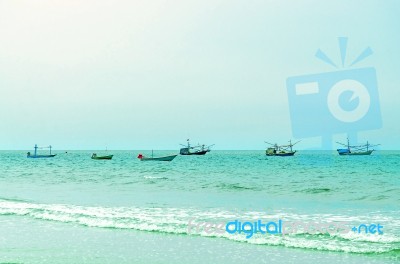 The View Of The Sand Beach And Sea Wave On The Afternoon Stock Photo