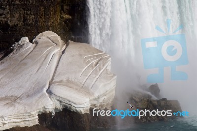 The Waterfall, Snow And Rocks Stock Photo