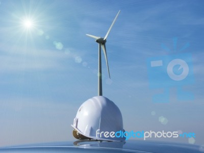 The  Wind Turbine And The Helmet Stock Photo