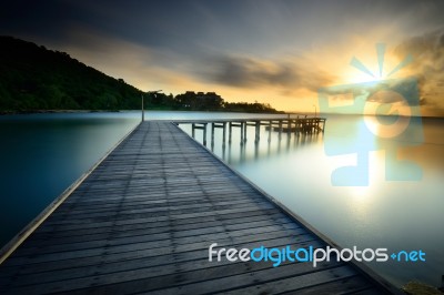 The Wooden Bridge With Sunrise At National Park Khao Leam Ya - M… Stock Photo