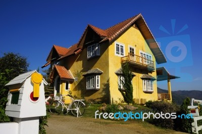 The Yellow House Is Located On A Hill In The North, Thailand Stock Photo