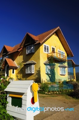 The Yellow House Is Located On A Hill In The North, Thailand Stock Photo