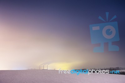 Thermal Power Plant And Cooling Towers At Night Stock Photo