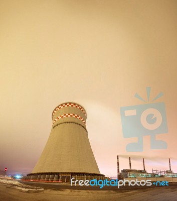 Thermal Power Plant And Cooling Towers At Night Stock Photo