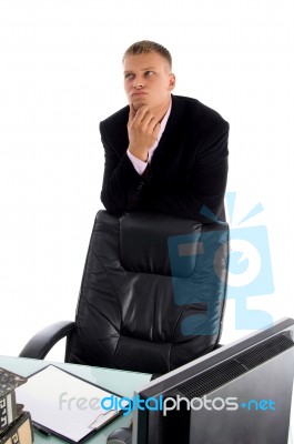 Thinking Businessman At Office Stock Photo