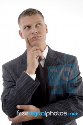 Thinking Businessman Looking Up Stock Photo