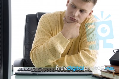 Thinking Male Looking At Screen Stock Photo