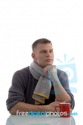 Thinking Young Man With Cup Stock Photo