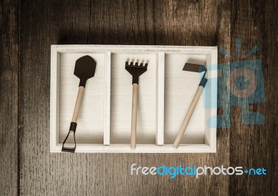 Three Farm Tools In The Box Stock Photo