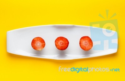 Three Fresh Slices Of Strawberry Stock Photo