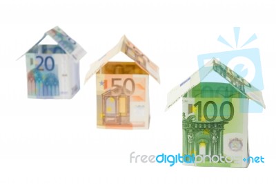 Three Houses Made Of Euro Notes Stock Photo