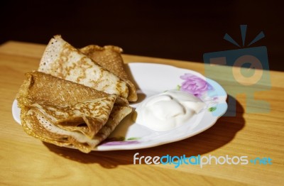 Three Pancakes With Sour Stock Photo