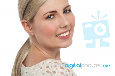 Tight Face Closeup Of Smiling Teen Blonde Girl Stock Photo