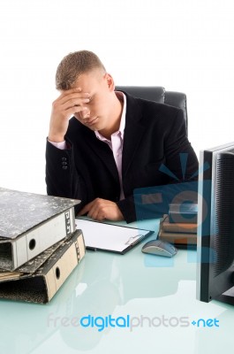 Tired Businessman At Work Place Stock Photo