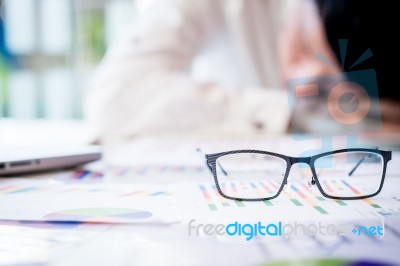 Tired Businessman Sleeping While Calculating Expenses At Desk I Stock Photo