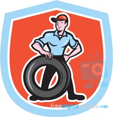 Tireman Mechanic With Tire Cartoon Shield Stock Image