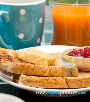 Toast For Breakfast Shows Meal Time And Beverages Stock Photo