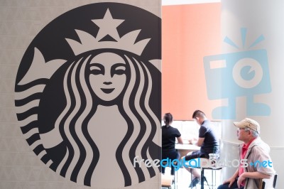 Tokyo - Apr 18: Starbucks Logo In Shibuya. It Is A Coffee Cafe O… Stock Photo