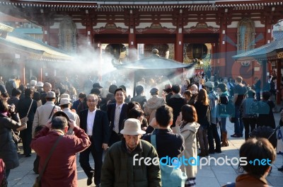 Tokyo, Japan - Nov 21: Buddhists Gather Around A Fire To Light I… Stock Photo