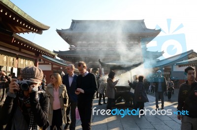 Tokyo, Japan - Nov 21: Buddhists Gather Around A Fire To Light I… Stock Photo